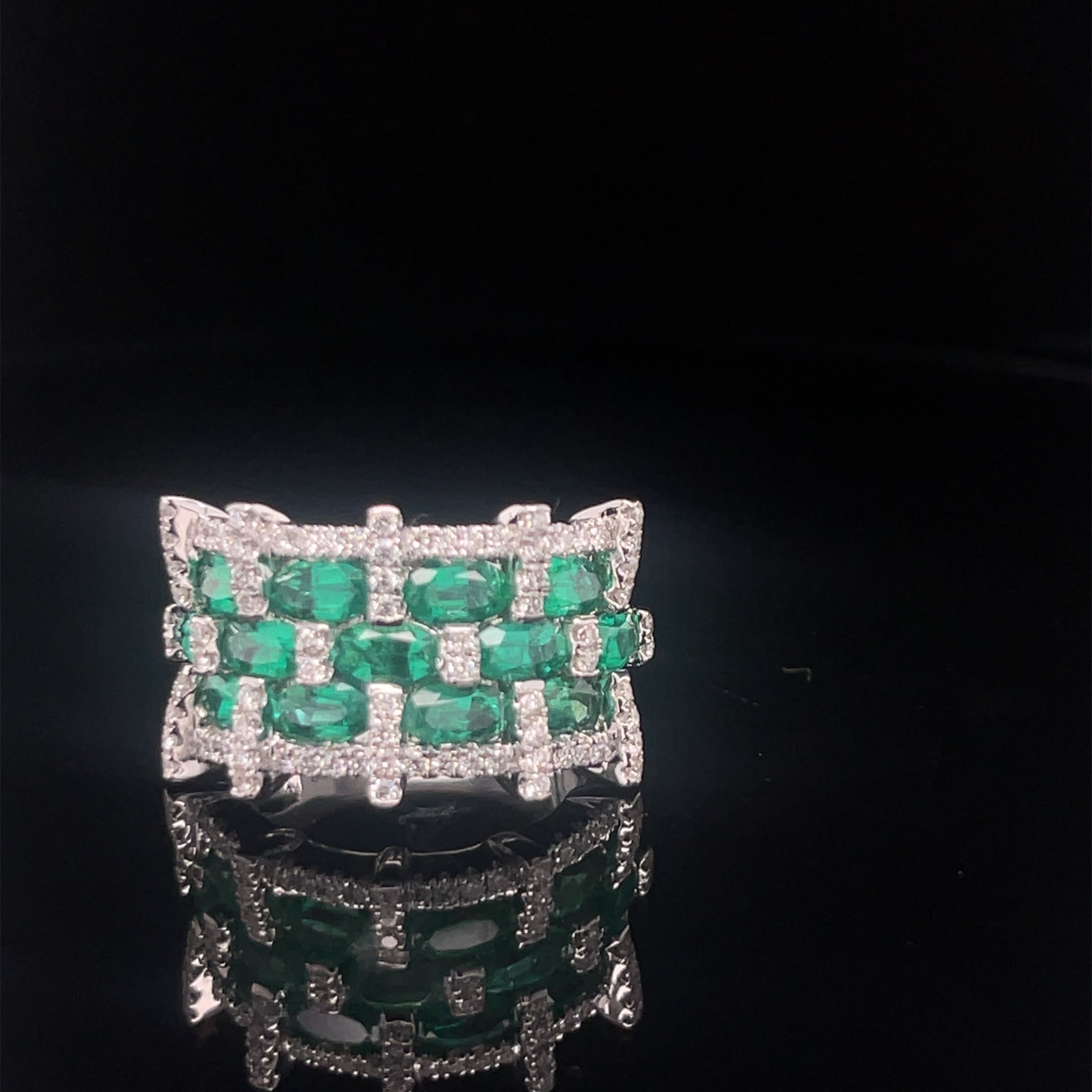 Emerald Weaved Ring