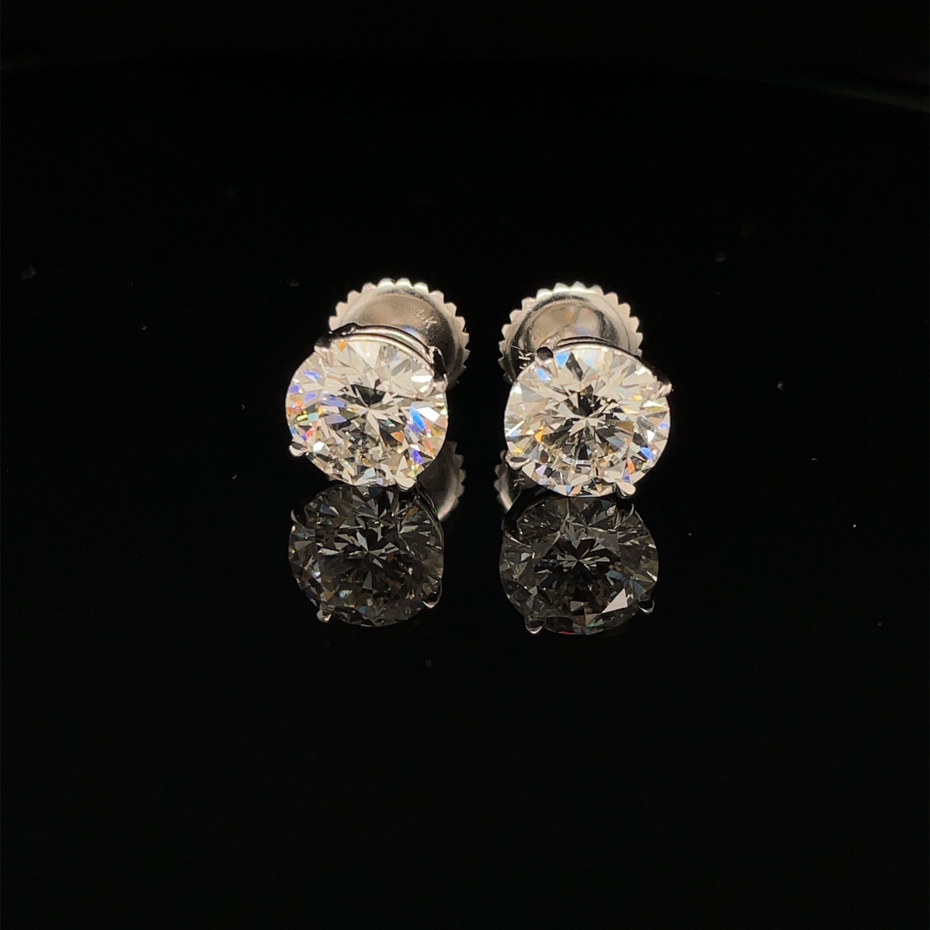 White Gold Diamond Solitaire Studs